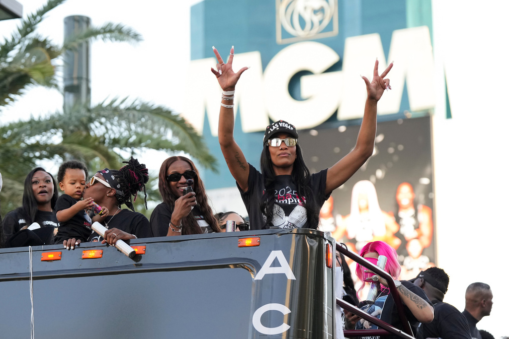 Las Vegas Aces forward A'ja Wilson celebrates during a rally to celebrate the team's WNBA championship Friday, Oct. 17, 2025, in Las Vegas. (AP Photo/Candice Ward)