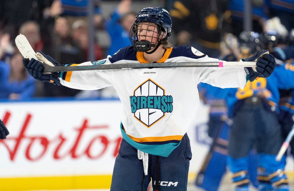 FILE - New York Sirens forward Sarah Fillier (10) reacts after the Toronto Sceptres scored an empty net goal during the third period of a PWHL hockey game in Toronto, Saturday Jan. 25, 2025. (Frank Gunn/The Canadian Press via AP, File)
