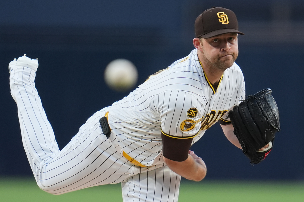 San Diego Padres starting pitcher Michael King works against a Seattle Mariners batter during the first inning of a baseball game Tuesday, April 14, 2026, in San Diego. (AP Photo/Gregory Bull)