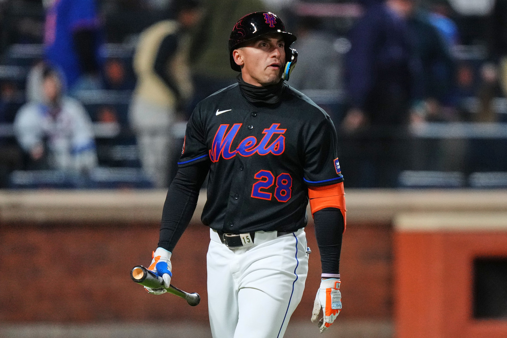 New York Mets' Tyrone Taylor (28) reacts after striking out to end a baseball game against the Minnesota Twins Tuesday, April 21, 2026, in New York. (AP Photo/Frank Franklin II)