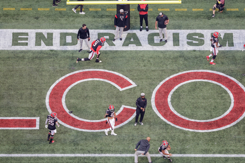 FILE - The Atlanta Falcons warm up in the endzone prior to an NFL football game against the San Francisco 49ers, Oct. 16, 2022, in Atlanta. (AP Photo/Stew Milne, File)