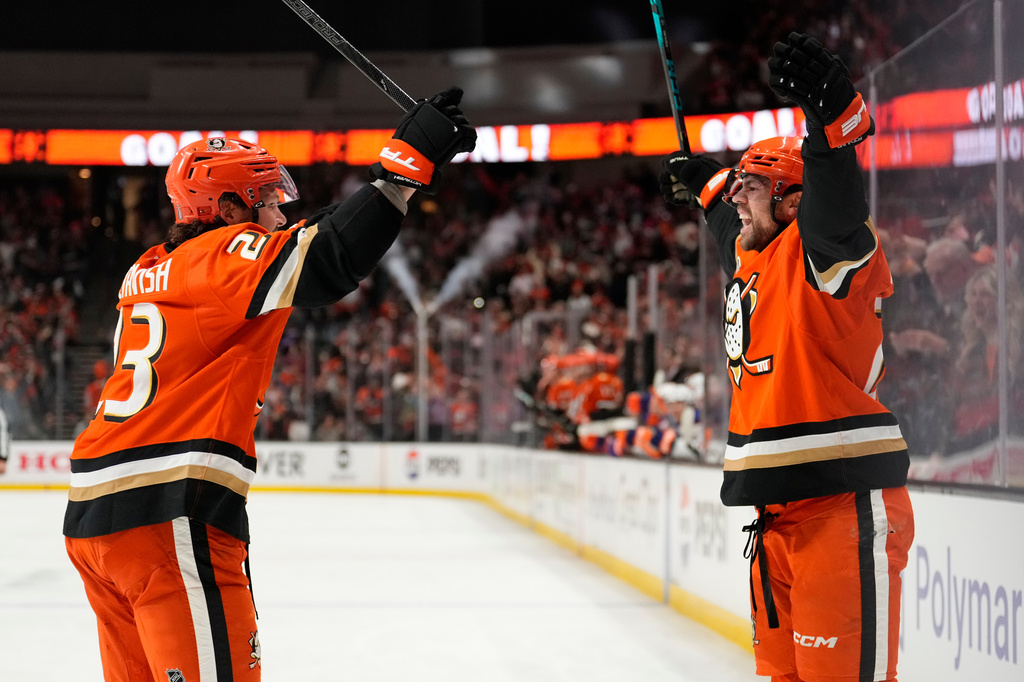 Anaheim Ducks center Ryan Poehling, right, celebrates his goal with center Mason McTavish during the first period of Game 6 in the first round of the NHL hockey Stanley Cup playoffs series against the Edmonton Oilers, Thursday, April 30, 2026, in Anaheim, Calif. (AP Photo/Mark J. Terrill)