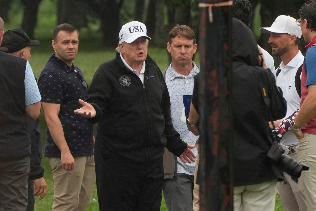 President Donald Trump speaks following a tour of the East Potomac Park golf course, Sunday, June 28, 2026, in Washington. (AP Photo/Mark Schiefelbein)