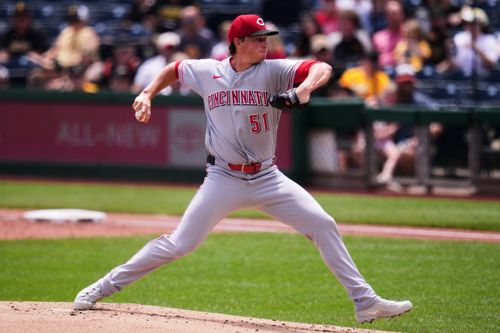 Cincinnati Reds pitcher Brady Singer delivers during the first inning of a baseball game against the Pittsburgh Pirates in Pittsburgh, Sunday, June 28, 2026. (AP Photo/Gene J. Puskar)