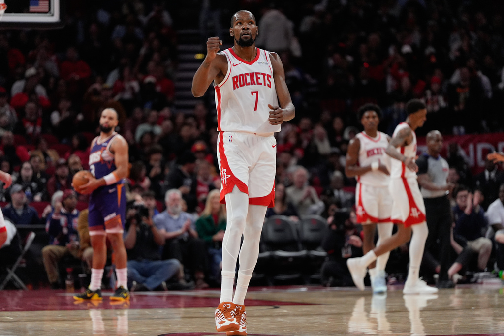 Houston Rockets forward Kevin Durant (7) celebrates during the first half of an NBA basketball game against the Phoenix Suns in Houston, Friday, Dec. 5, 2025. (AP Photo/Ashley Landis)