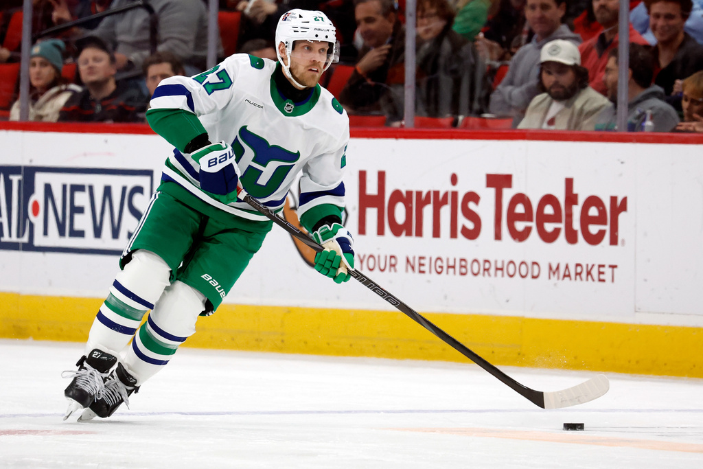 Carolina Hurricanes' Nikolaj Ehlers controls the puck during the second period of an NHL hockey game against the Utah Mammoth in Raleigh, N.C., Thursday, Jan. 29, 2026. (AP Photo/Karl DeBlaker)