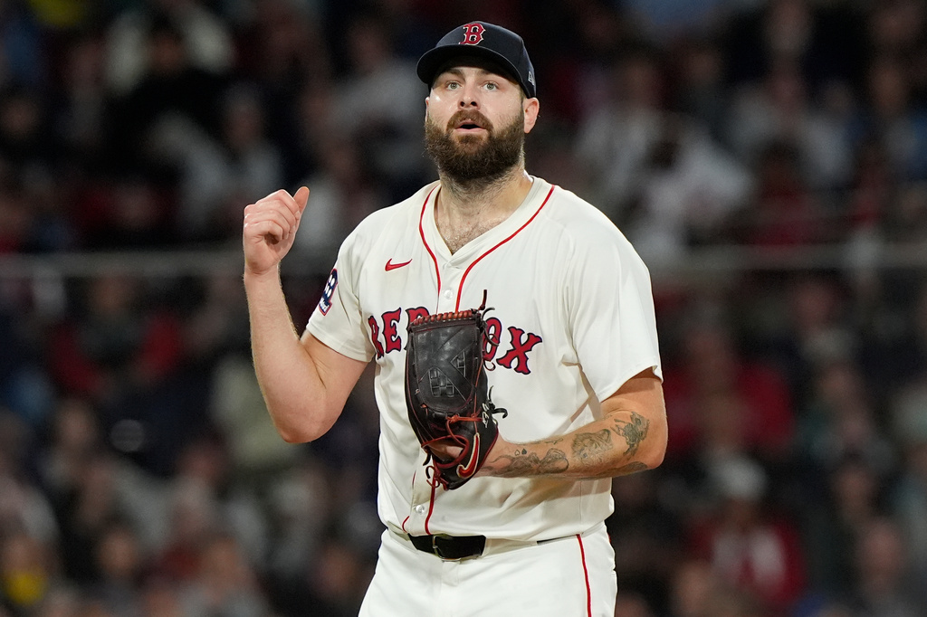 FILE - Boston Red Sox pitcher Lucas Giolito reacts after striking out Athletics Lawrence Butler with the bases loaded in the third inning in of a baseball game against the Athletics, Wednesday, Sept. 17, 2025, in Boston. (AP Photo/Robert F. Bukaty, File)