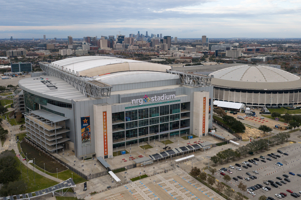 FILE - An aerial view of the NRG Stadium, one of the stadiums that will host 2026 FIFA World Cup matches, in Houston, Monday, Feb. 2, 2026. The Astrodome is pictured on right. (AP Photo/Jon Shapley, File)