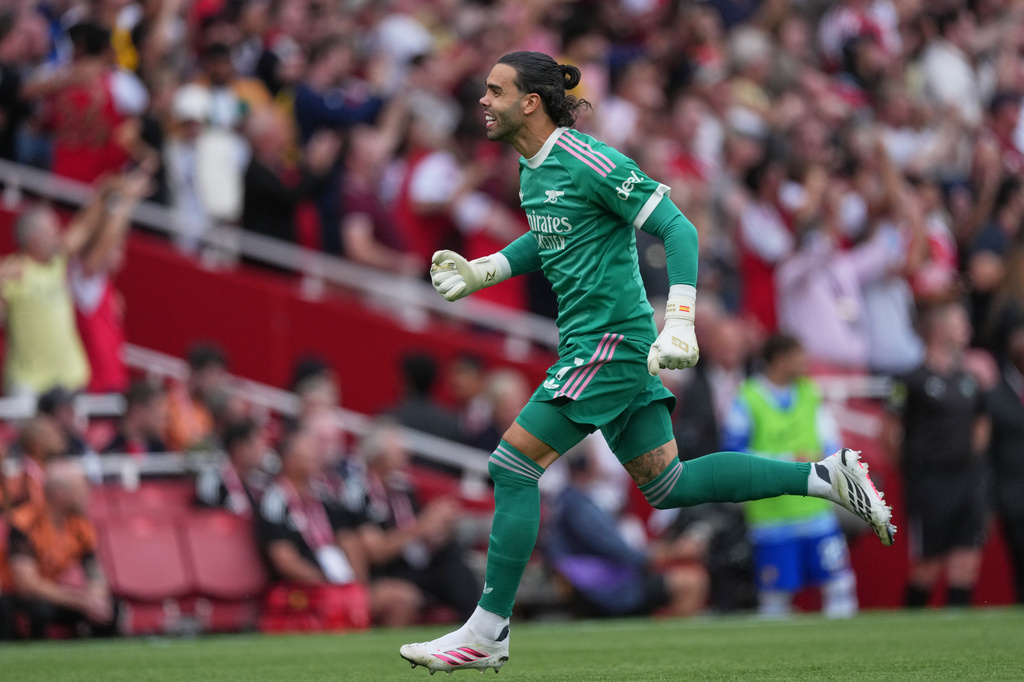 Arsenal's goalkeeper David Raya reacts during the English Premier League soccer match between Arsenal and Chelsea in London, Sunday, Sept. 6, 2026. (AP Photo/Dave Shopland)