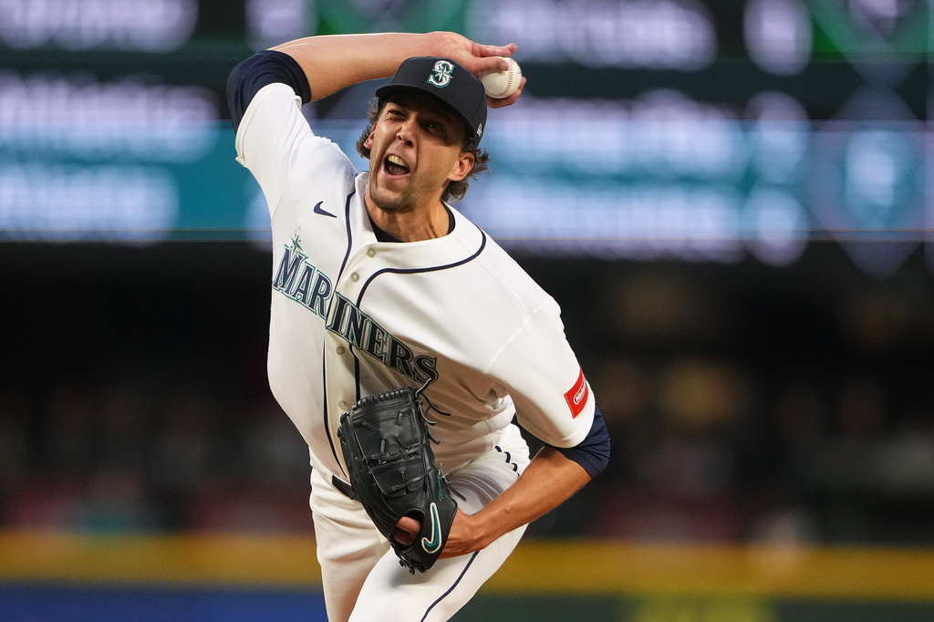 Seattle Mariners starting pitcher Logan Gilbert throws against the New York Yankees during the fourth inning of a baseball game, Tuesday, March 31, 2026, in Seattle. (AP Photo/Lindsey Wasson)