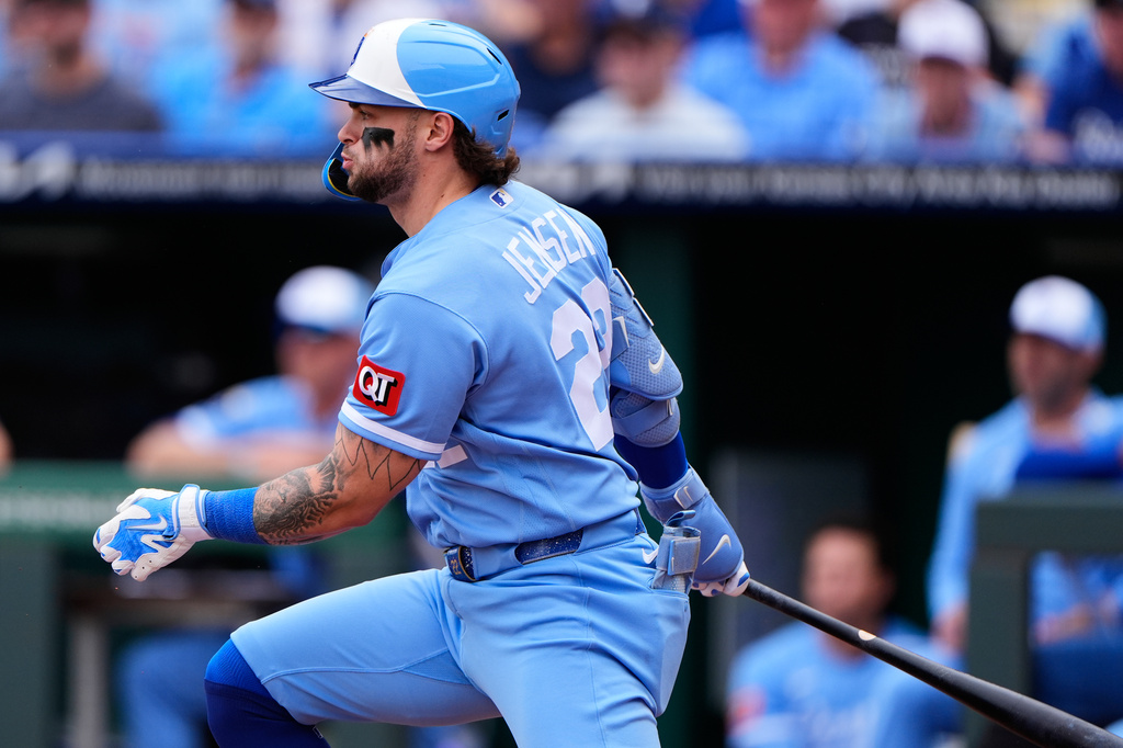 Kansas City Royals' Carter Jensen watches his RBI single during the first inning of a baseball game against the Seattle Mariners, Saturday, May 23, 2026, in Kansas City, Mo. (AP Photo/Charlie Riedel)