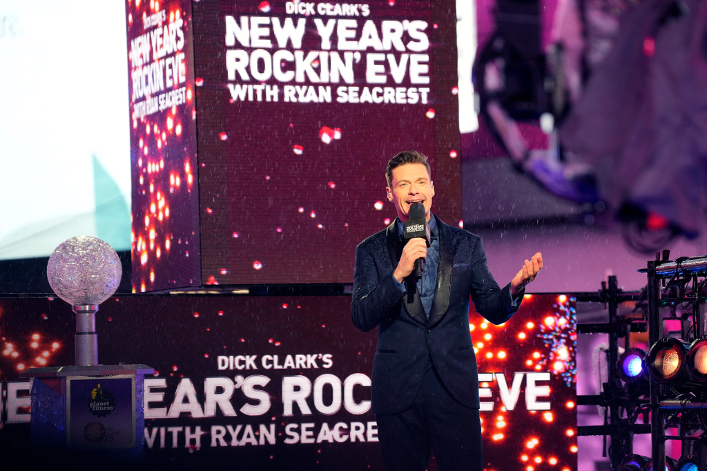 FILE - Ryan Seacrest hosts "Dick Clark's New Year's Rockin' Eve" during the Times Square New Year's Eve celebration on Tuesday, Dec. 31, 2024, in New York. (Photo by Charles Sykes/Invision/AP, File)