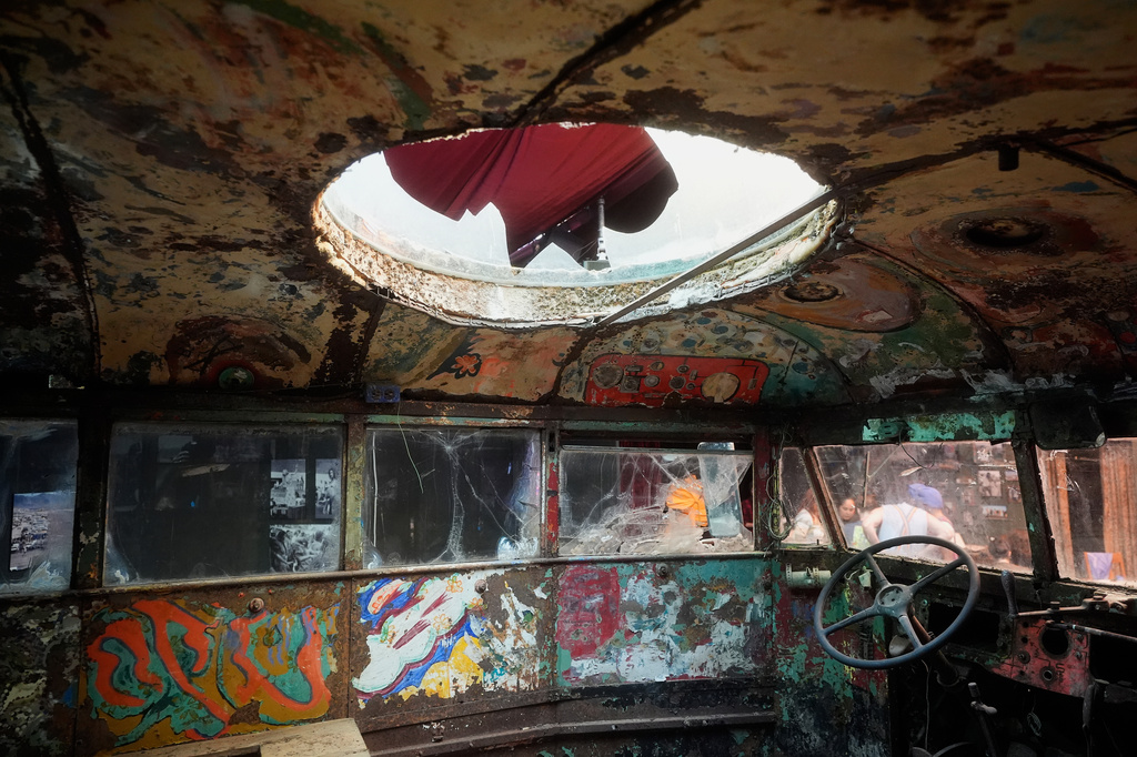 The interior of Ken Kesey's psychedelic bus "Furthur" is shown while displayed at the Forever Grateful exhibit presented by the Haight Street Art Center at the County Fair Building in Golden Gate Park, Tuesday, Sept. 1, 2026, in San Francisco. (AP Photo/Jeff Chiu)