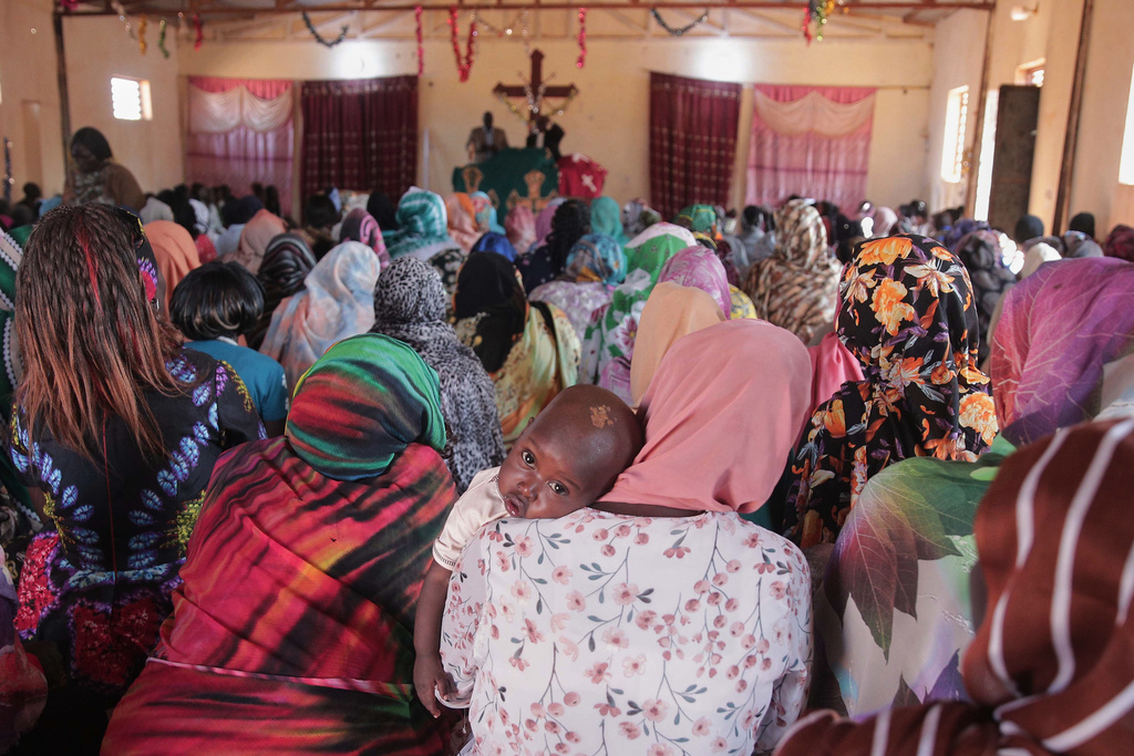 Christian devotees pray at Omdurman church on Christmas Day, in Khartoum, Sudan, Thursday, Dec. 25, 2025. (AP Photo/Marwan Ali)