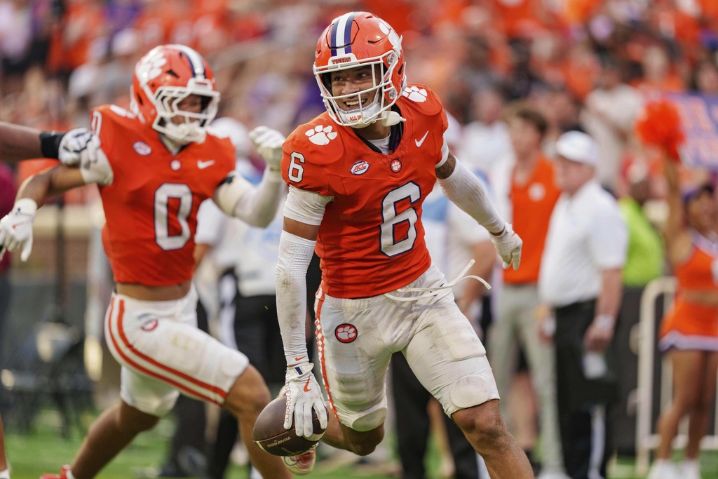 Clemson safety Ricardo Jones (6) reacts after making an interception in the second half of an NCAA college football game against Troy, Saturday, Sept. 6, 2025, in Clemson, S.C. (AP Photo/Jacob Kupferman)