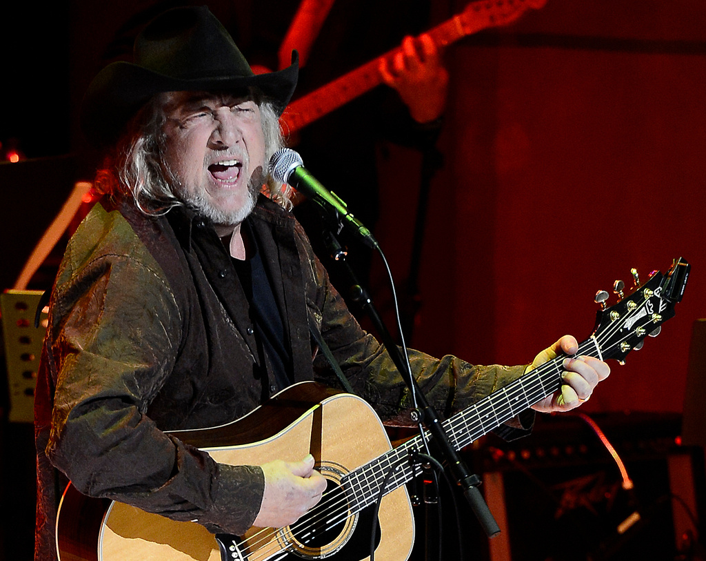FILE - John Anderson performs at the ceremony for the 2013 inductions into the Country Music Hall of Fame in Nashville, Tenn., on Oct. 27, 2013. (AP Photo/Mark Zaleski, File)