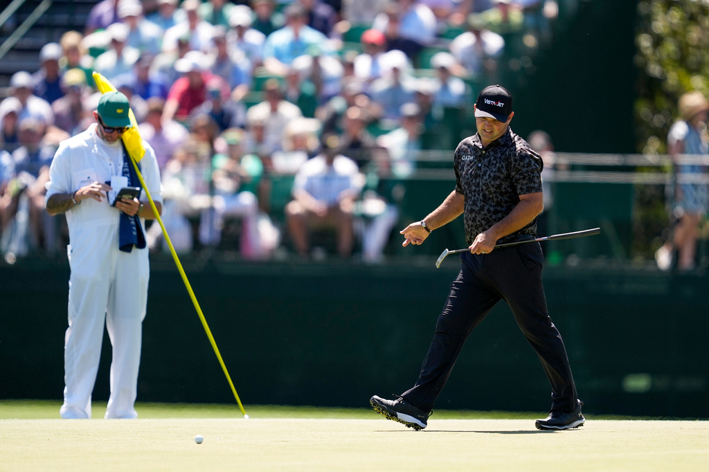Patrick Reed reacts after missing a putt on the 15th hole during the first round of the Masters golf tournament at the Augusta National Golf Club, Thursday, April 9, 2026, in Augusta, Ga. (AP Photo/Ashley Landis)