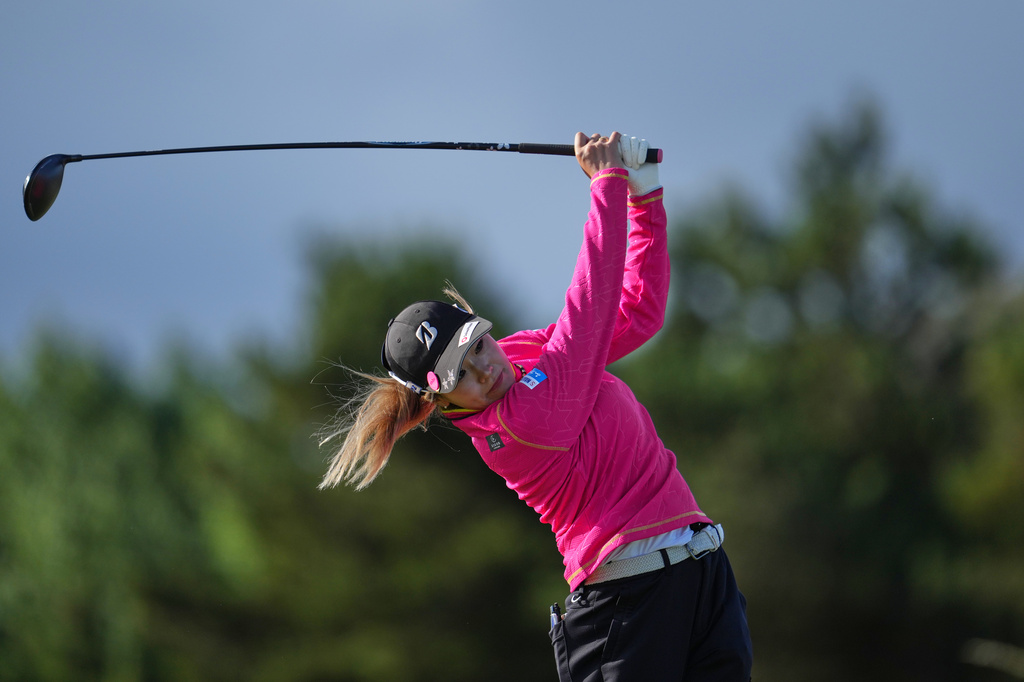 Shiho Kuwaki, of Japan, drives off the 4th tee during the second round of the Women's British Open golf championship in Lytham St Annes, England, Friday, July 31, 2026. (AP Photo/Jon Super)