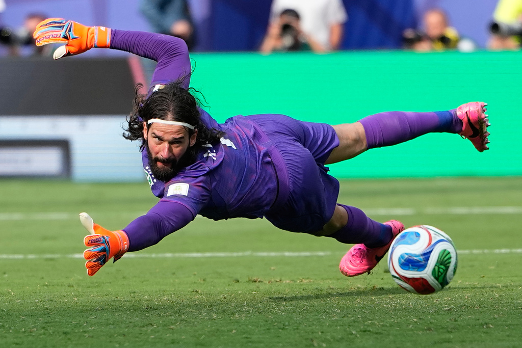 Norway's Erling Haaland scores his second goal past Brazil goalkeeper Alisson Becker (1) during the World Cup round of 16 soccer match between Brazil and Norway in East Rutherford, N.J., near New York, Sunday, July 5, 2026. (AP Photo/Frank Franklin II)