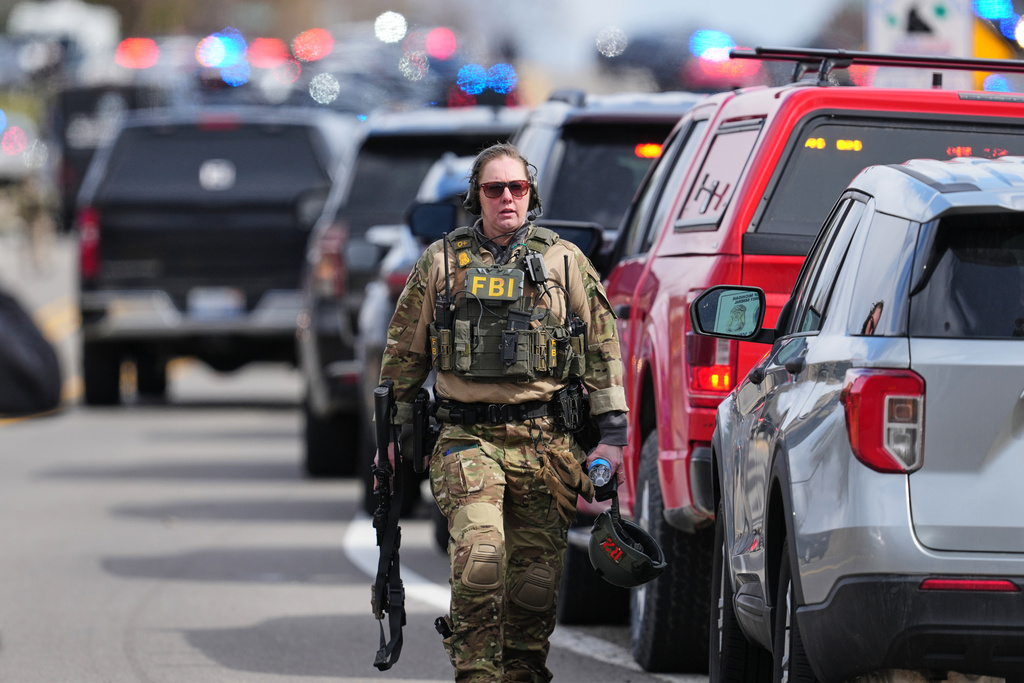 Law enforcement respond to a call at Temple Israel synagogue Thursday, March 12, 2026, in West Bloomfield Township, Mich. (AP Photo/Paul Sancya)