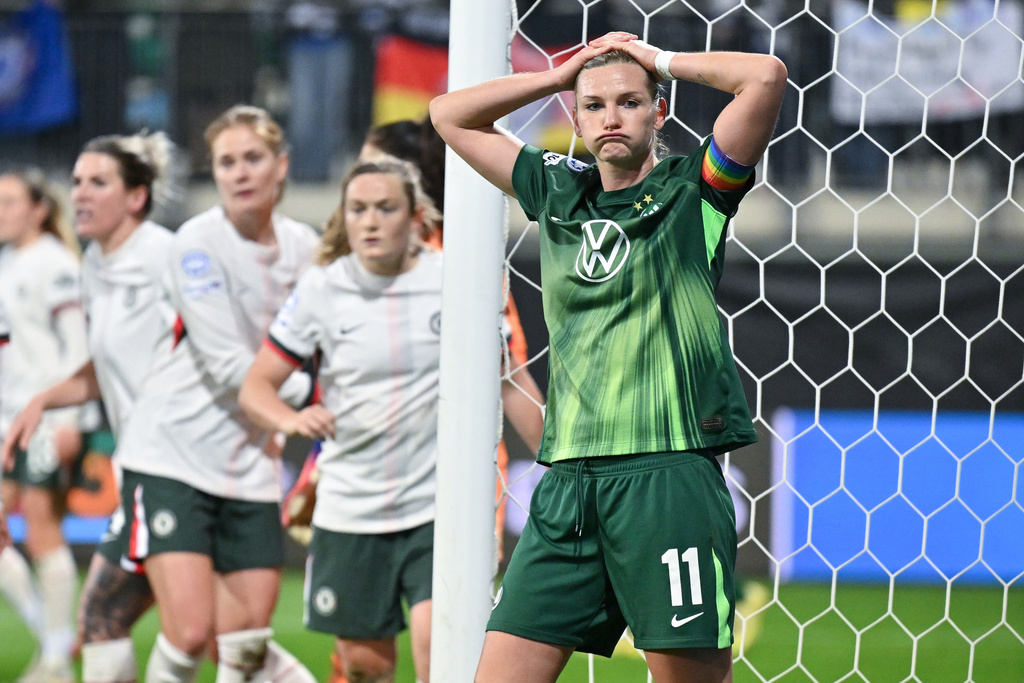 VfL Wolfsburg's Alexandra Popp reacts during the women's Champions League opening phase soccer match between VfL Wolfsburg and Chelsea in Wolfsburg, Germany, Wednesday, Dec. 17, 2025. (Swen Pförtner/dpa via AP)