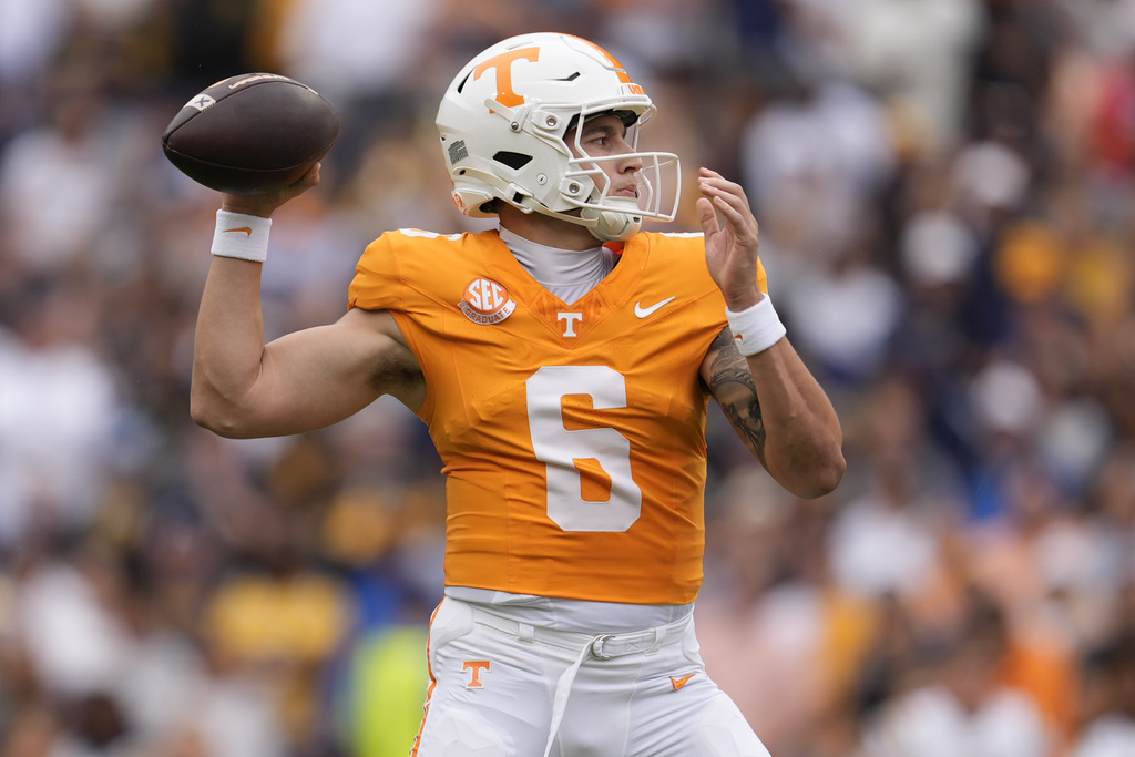 Tennessee quarterback Joey Aguilar (6) looks to throw a pass during the first half of an NCAA college football game against East Tennessee State, Saturday, Sept. 6, 2025, in Knoxville, Tenn. (AP Photo/George Walker IV)