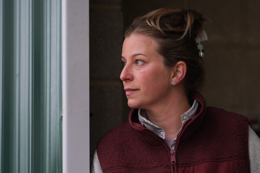 Trainer Brittany Russell talks to people in her barn ahead of the 102nd running of the Black-Eyed Susan horse race, Friday, May 15, 2026, at Laurel Park in Laurel, Md. (AP Photo/Julia Demaree Nikhinson)