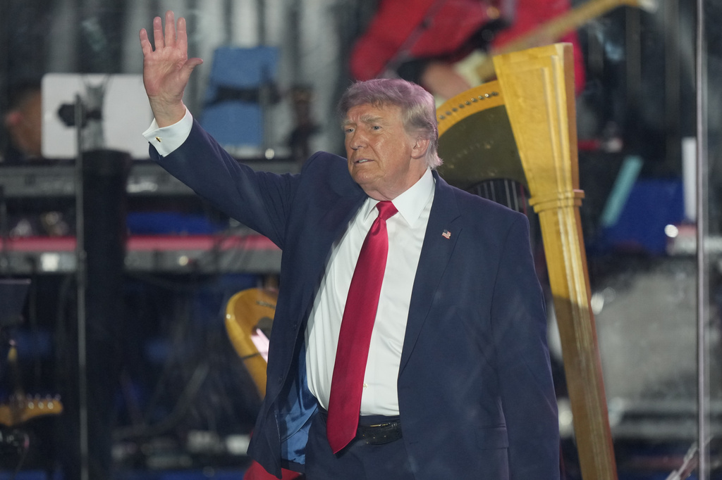 President Donald Trump waves after speaking at the opening of the Great American State Fair on the National Mall, Wednesday, June 24, 2026, in Washington. (AP Photo/Alex Brandon)
