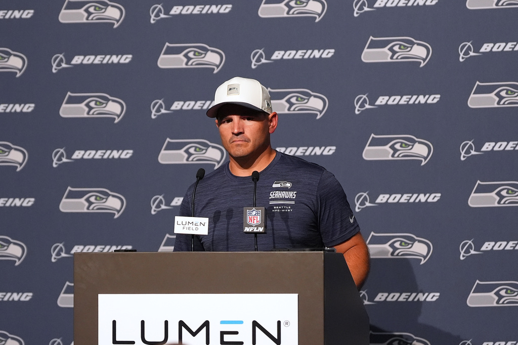 Seattle Seahawks head coach Mike Macdonald speaks during a press availability after the NFL football team's training camp, Saturday, Aug. 8, 2026, in Seattle. (AP Photo/Lindsey Wasson)