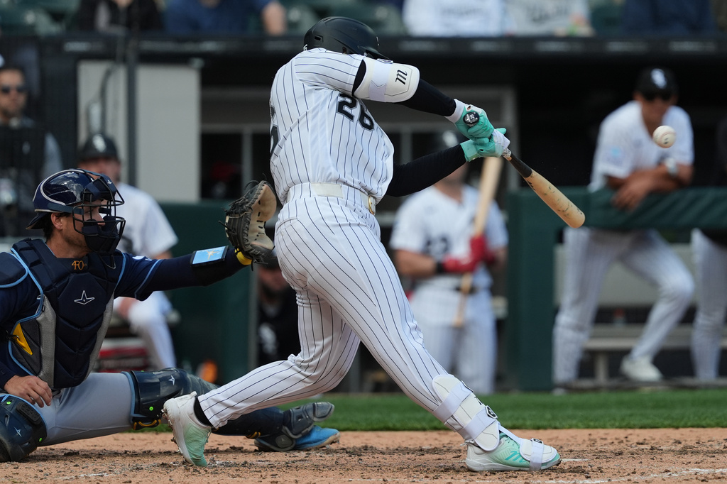 Chicago White Sox's Edgar Quero hits a one-run ground-rule double during the sixth inning of a baseball game against Tampa Bay Rays in Chicago, Thursday, April 16, 2026. (AP Photo/Nam Y. Huh)