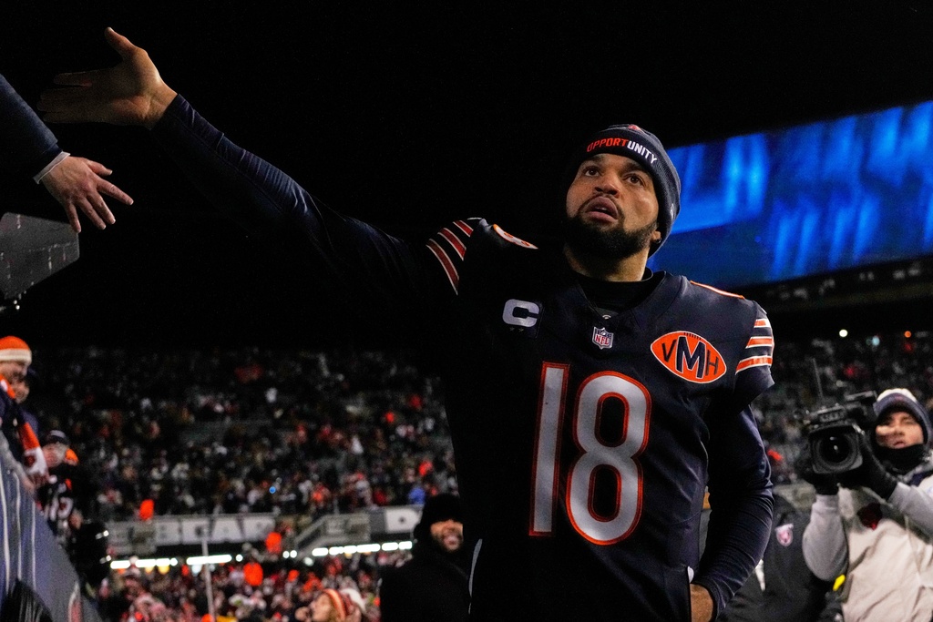Chicago Bears' Caleb Williams celebrates after overtime of an NFL football game against the Green Bay Packers Saturday, Dec. 20, 2025, in Chicago. (AP Photo/Nam Huh)
