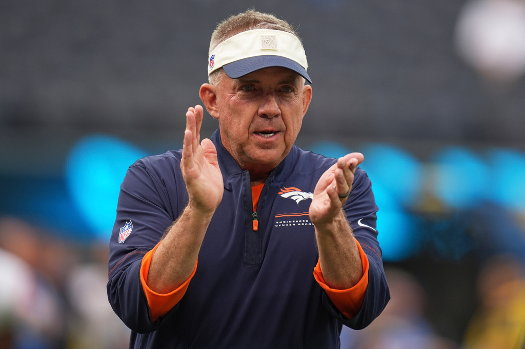 Denver Broncos head coach Sean Payton cheers his team prior to an NFL football game against the Los Angeles Chargers, Sunday, Oct. 11, 2026, in Inglewood, Calif. (AP Photo/Gregory Bull)