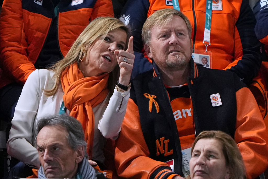Dutch King Willem-Alexander listen to Queen Maxima as they watch the women's 1,000 meters speedskating race at the 2026 Winter Olympics, in Milan, Italy, Monday, Feb. 9, 2026. (AP Photo/Antonio Calanni)