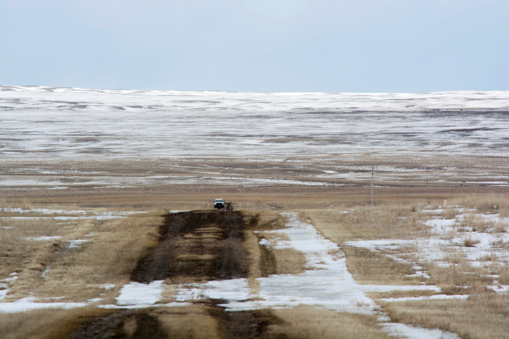FILE - This photo provided by the Bureau of Land Management shows the proposed route of the Keystone XL oil pipeline where it crosses into the United States from Canada in Phillips County, Mont., March 11, 2020. (Al Nash/Bureau of Land Management via AP, File)