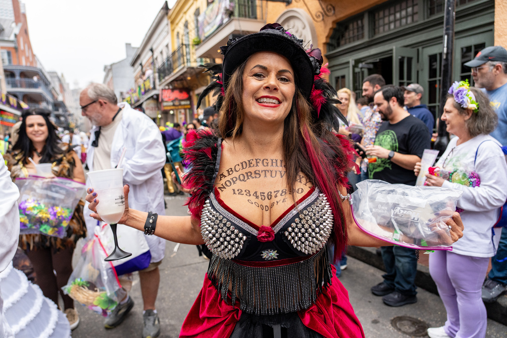 Attendees participate in the annual Krewe of Bosom Buddies Parade during the Mardi Gras season on Friday, Feb. 13, 2026, in New Orleans. (Photo by Amy Harris/Invision/AP)