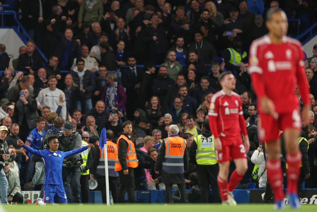 Chelsea's Estevao celebrates after scoring his side's second goal during the English Premier League soccer match between Chelsea and Liverpool at Stamford Bridge in London, Saturday, Oct. 4, 2025. (AP Photo/Ian Walton)