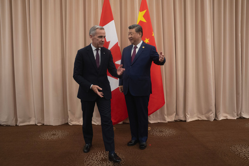 Canadian Prime Minister Mark Carney, left, meets Chinese President Xi Jinping at the start of a meeting in Gyeongju, South Korea Friday, Oct. 31, 2025. (Adrian Wyld/The Canadian Press via AP) Canadian Prime Minister Mark Carney, left, meets Chinese President Xi Jinping at the start of a meeting in Gyeongju, South Korea Friday, Oct. 31, 2025. (Adrian Wyld/The Canadian Press via AP)