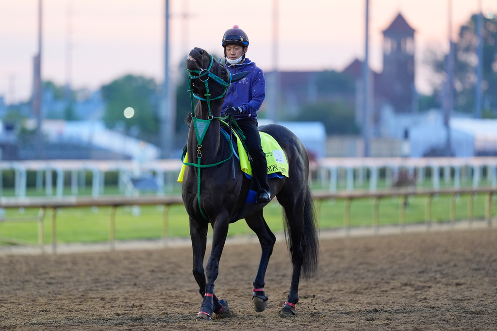 Kentucky Derby entrant Danon Bourbon works out at Churchill Downs Monday, April 27, 2026, in Louisville, Ky. (AP Photo/Charlie Riedel)