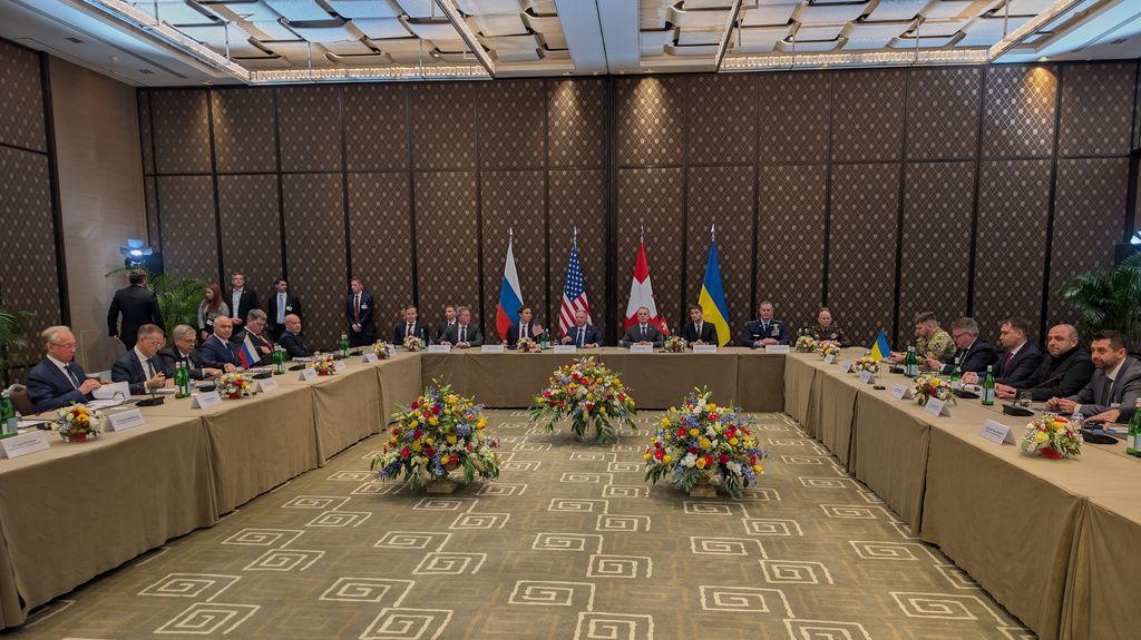 In this photo provided by the National Security and Defense Council of Ukraine press office, U.S., center, Ukrainian, right, and Russian delegations attend the next round of trilateral talks on Russia-Ukraine war in Geneva, Switzerland, Tuesday, Feb. 17, 2026. (Ukrainian National Security and Defense Council press office via AP)