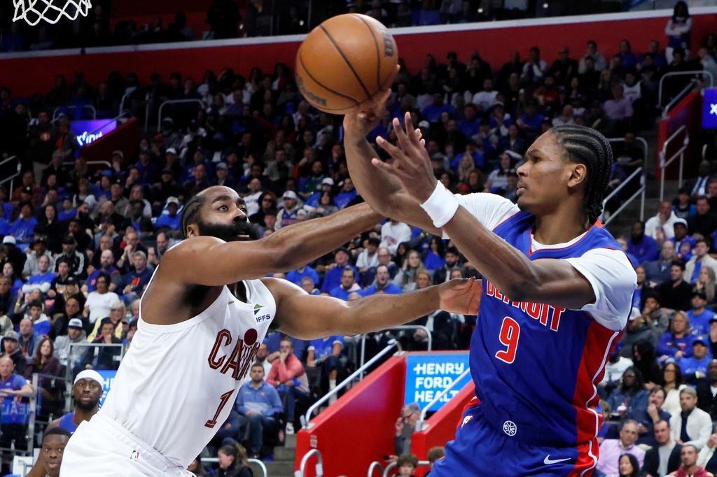 Detroit Pistons guard Ausar Thompson (9) passes the ball against Cleveland Cavaliers guard James Harden (1) during the first half in Game 5 of a second-round NBA playoffs basketball series, Wednesday, May 13, 2026, in Detroit. (AP Photo/Duane Burleson)