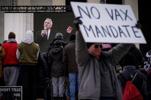 FILE - Robert F. Kennedy Jr. is broadcast on a large screen as he speaks during an anti-vaccine rally in front of the Lincoln Memorial in Washington, Sunday, Jan. 23, 2022. (AP Photo/Patrick Semansky, File) FILE - Robert F. Kennedy Jr. is broadcast on a large screen as he speaks during an anti-vaccine rally in front of the Lincoln Memorial in Washington, Sunday, Jan. 23, 2022. (AP Photo/Patrick Semansky, File)