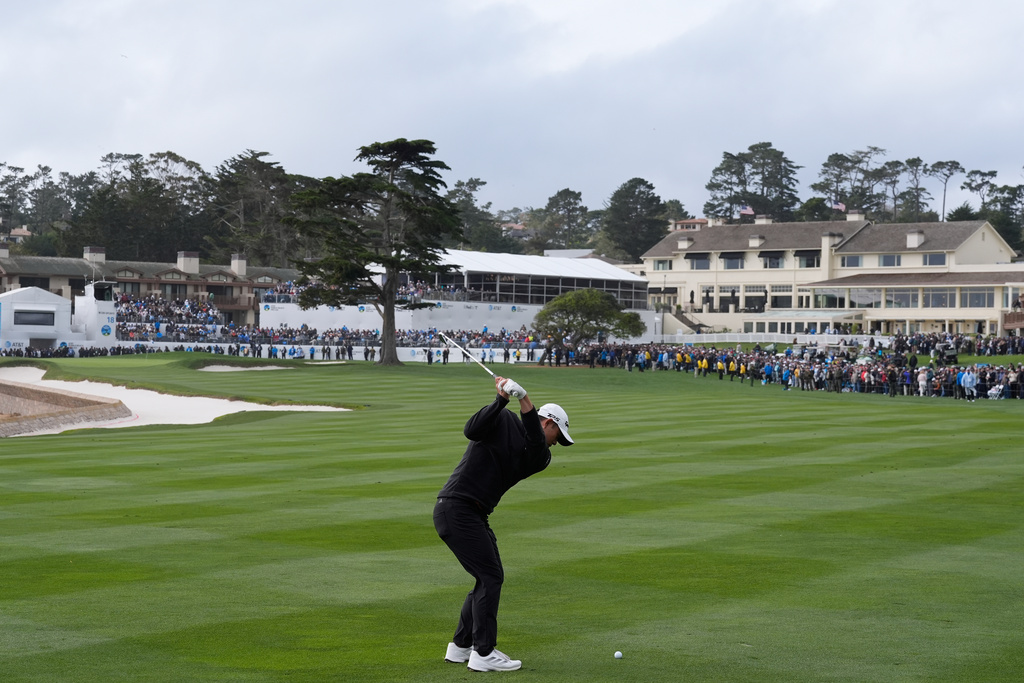 Collin Morikawa hits from the 18th fairway at Pebble Beach Golf Links during the final round of the AT&T Pebble Beach Pro-Am golf tournament in Pebble Beach, Calif., Sunday, Feb. 15, 2026. (AP Photo/Godofredo A. Vásquez)