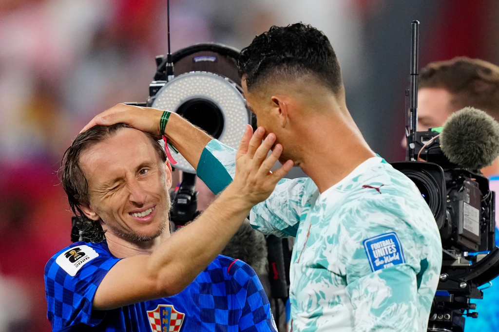 Croatia's Luka Modric (10) and Portugal's Cristiano Ronaldo (7) greet each other after the World Cup round of 32 soccer match between Portugal and Croatia in Toronto, Thursday, July 2, 2026. (Frank Gunn/The Canadian Press via AP)