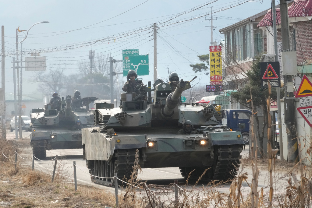 South Korean army's tanks move to attend a joint river-crossing exercise between South Korea and the United States as a part of the Freedom Shield military exercise in Yeoncheon, South Korea, Saturday, March 14, 2026. (AP Photo/Ahn Young-joon)