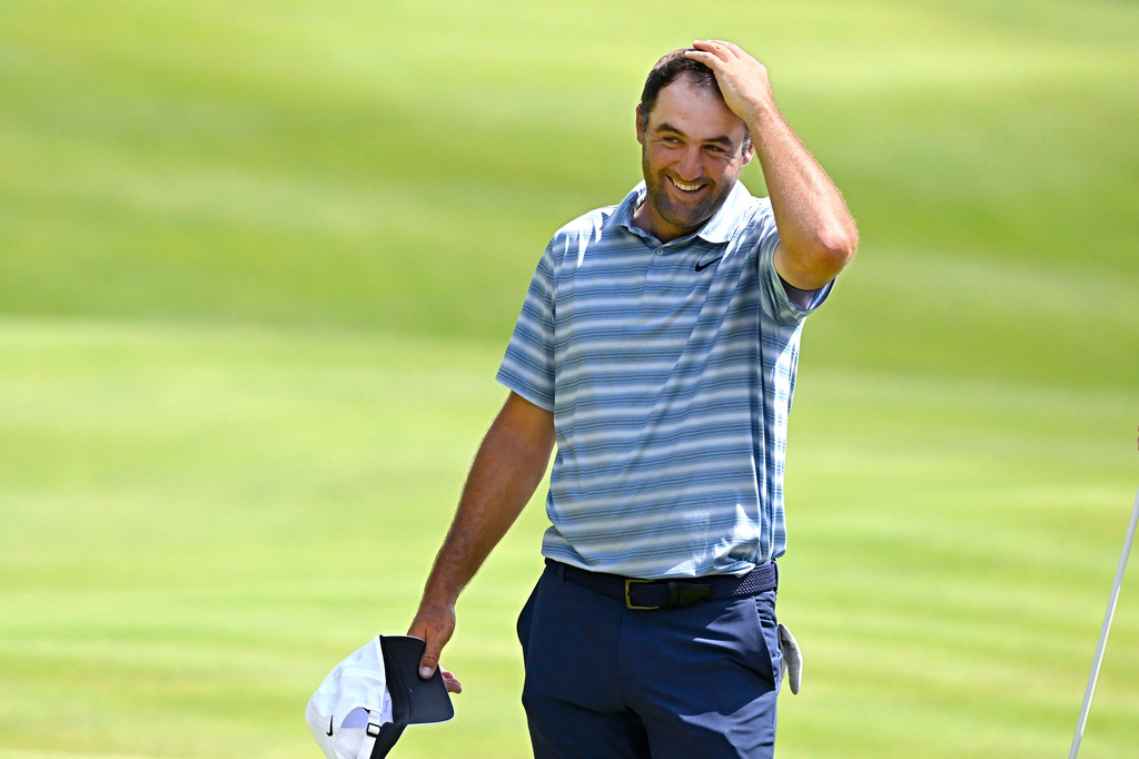 Scottie Scheffler reacts after finishing the second round of the Travelers Championship golf tournament at TPC River Highlands, Friday, June 26, 2026, in Cromwell, Conn. (AP Photo/Jessica Hill)