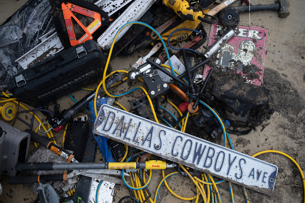 Flood debris and damage scatter the Buckhorn Lake Resort RV Park following floods along West Goat Creek near the Guadalupe River on Friday, July 17, 2026, in Kerrville, Texas. (AP Photo/Joel Angel Juarez)