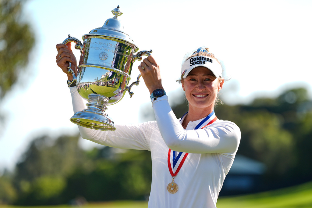 Nelly Korda holds the trophy after winning the U.S. Women's Open golf tournament Sunday, June 7, 2026, in the Pacific Palisades area of Los Angeles. (AP Photo/Ashley Landis)