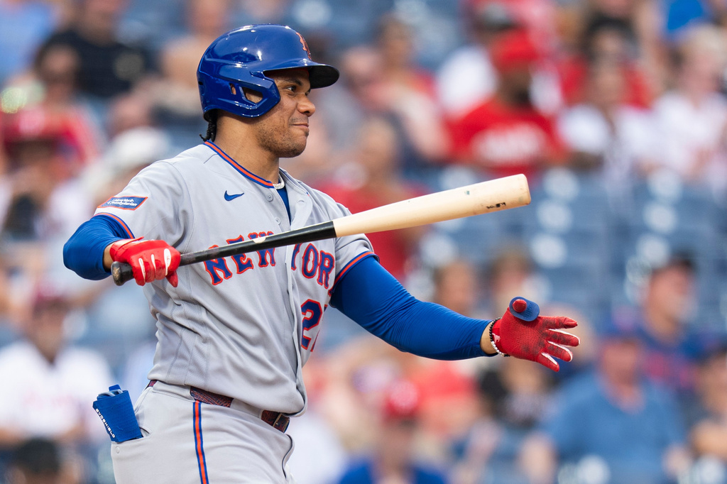 New York Mets' Juan Soto reacts to striking out during the fifth inning of a baseball game against the Philadelphia Phillies, Saturday, July 18, 2026, in Philadelphia. (AP Photo/Chris Szagola)