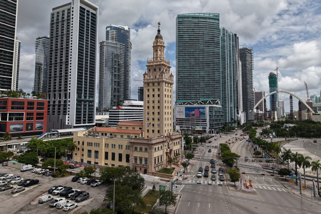 The Freedom Tower is seen in downtown Miami on Friday, Aug. 8, 2025. (AP Photo/Daniel Kozin)