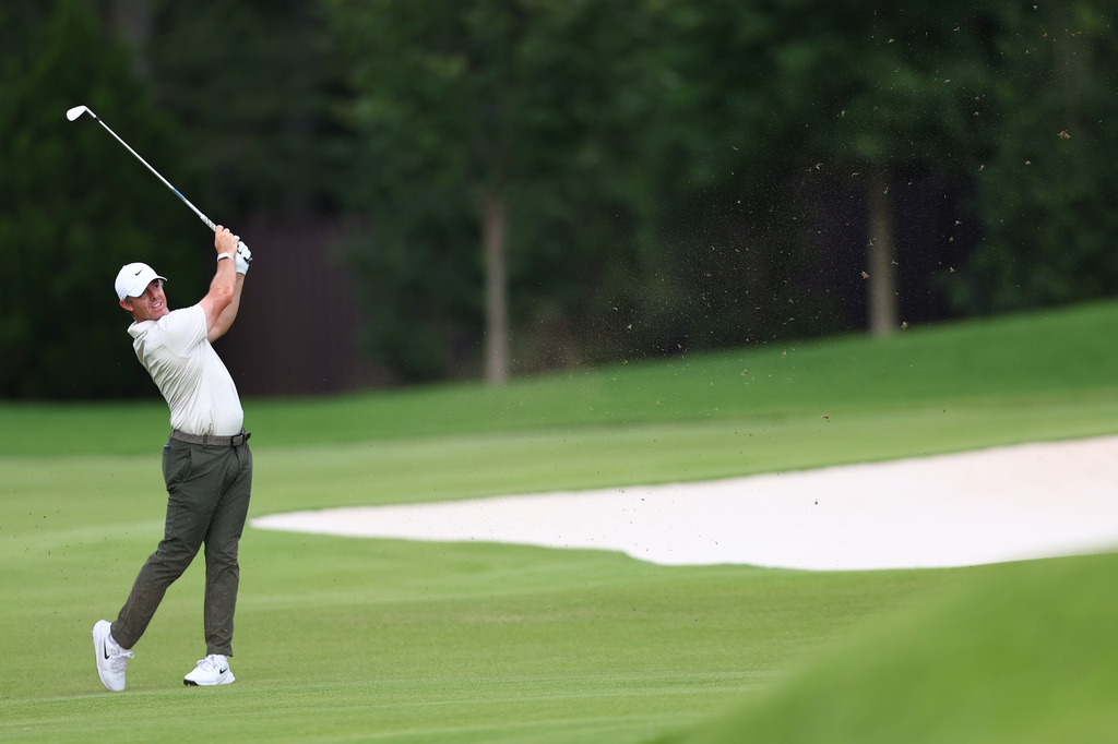 Rory McIlroy, of Northern Ireland, hits from the seventh fairway during the final round of the PGA Tour Championship golf tournament Sunday, Aug. 30, 2026, in Atlanta. (AP Photo/Colin Hubbard)